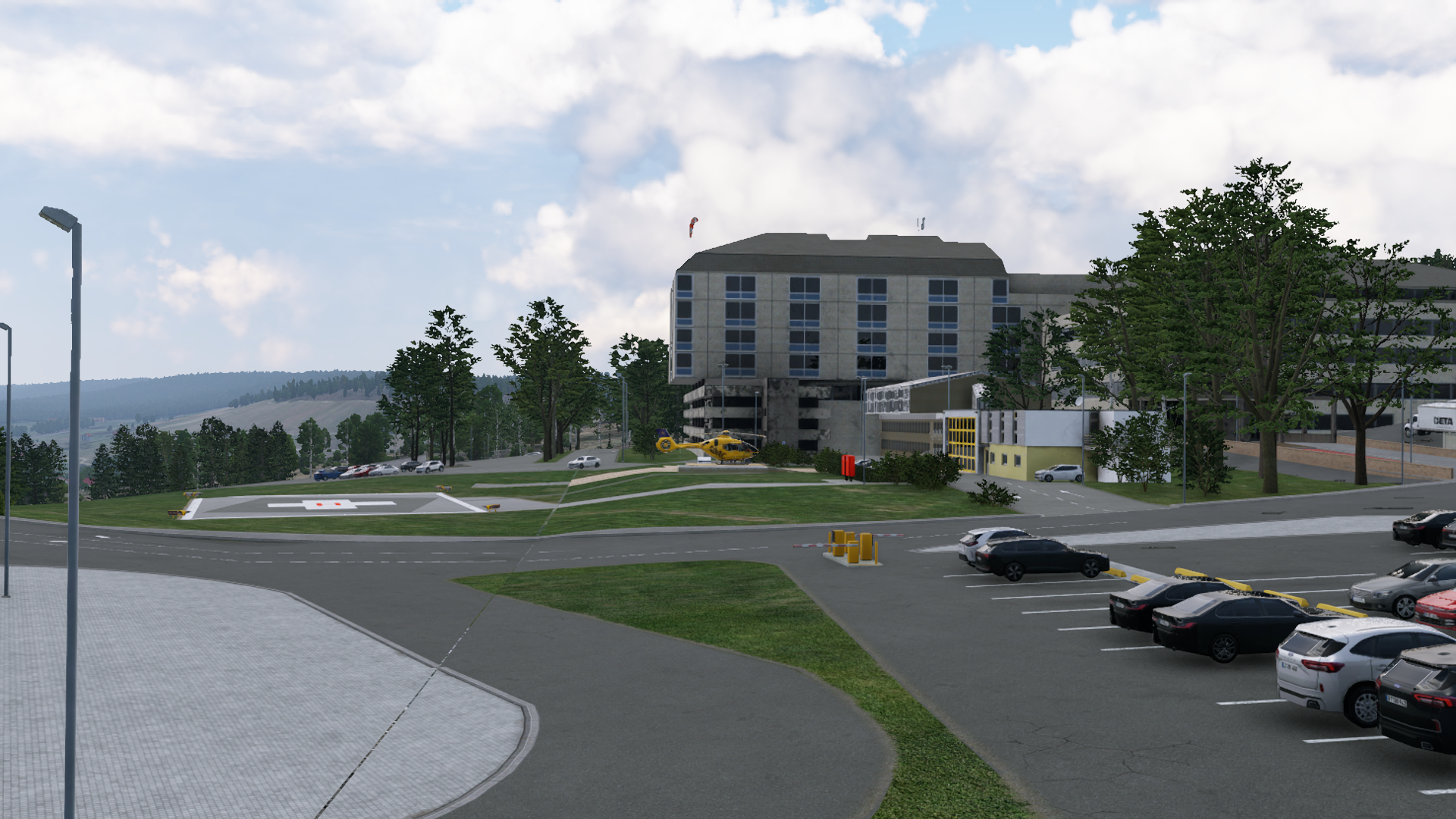 Blick vom Parkplatz auf das Gelände mit dem Klinikum und der Station von Christoph 10