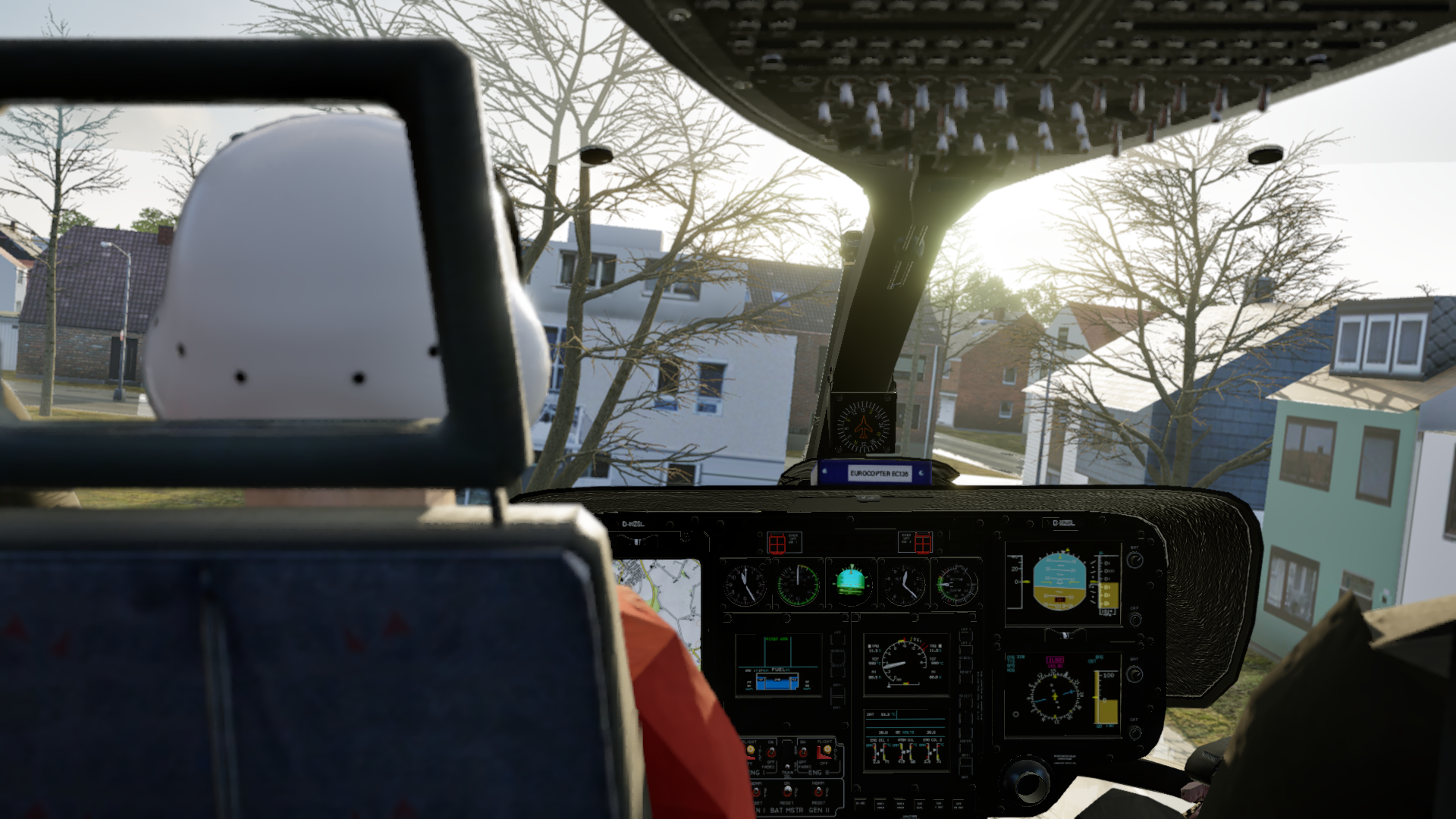Blick aus der Kabine der EC 135 V5 bei einer Landung in einer Ortslage